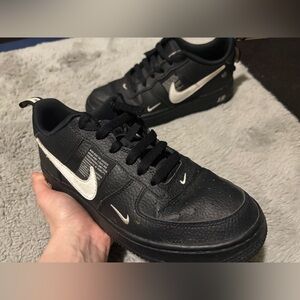 Nike Black Sneakers with White Swoosh